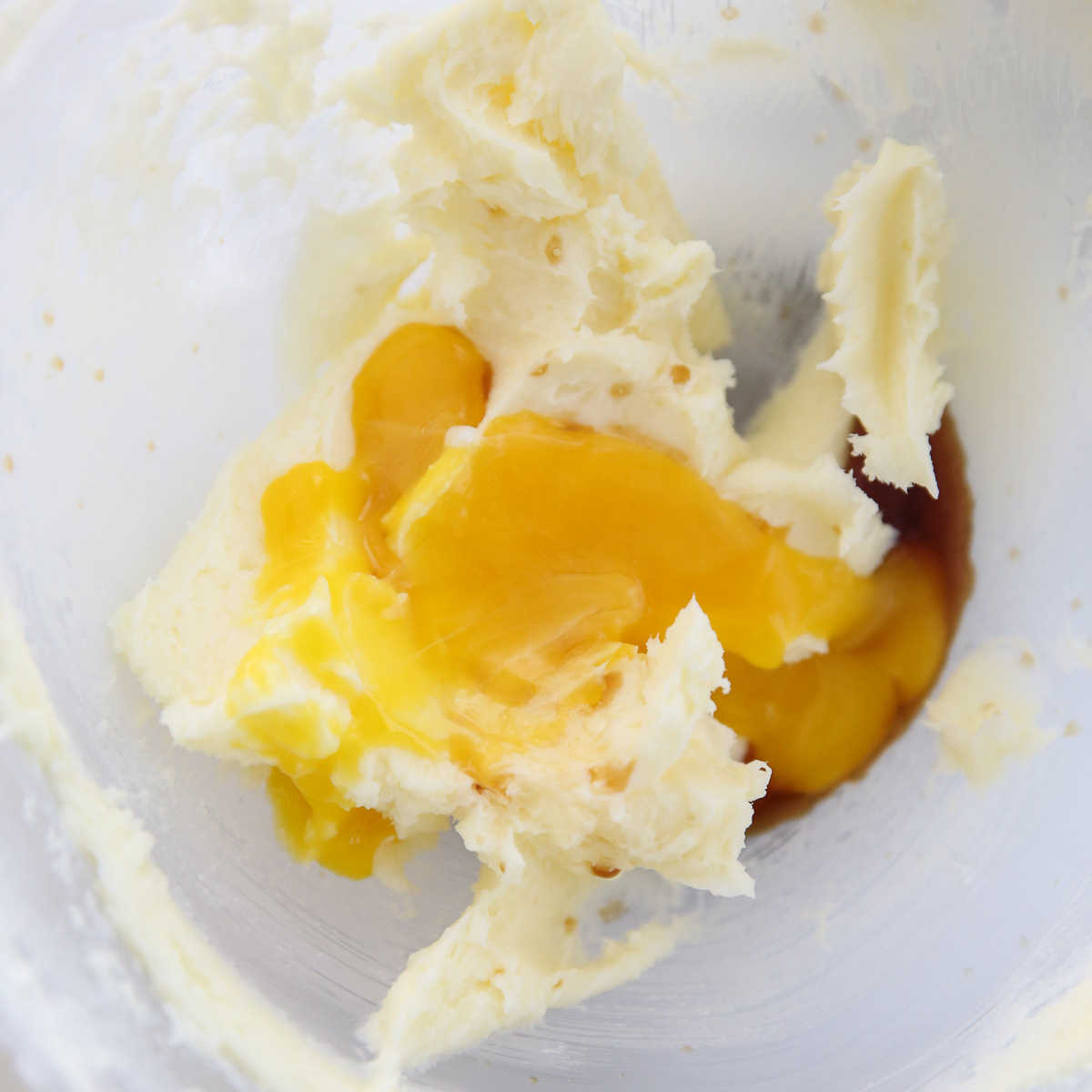 egg yolk over creamed butter and sugar