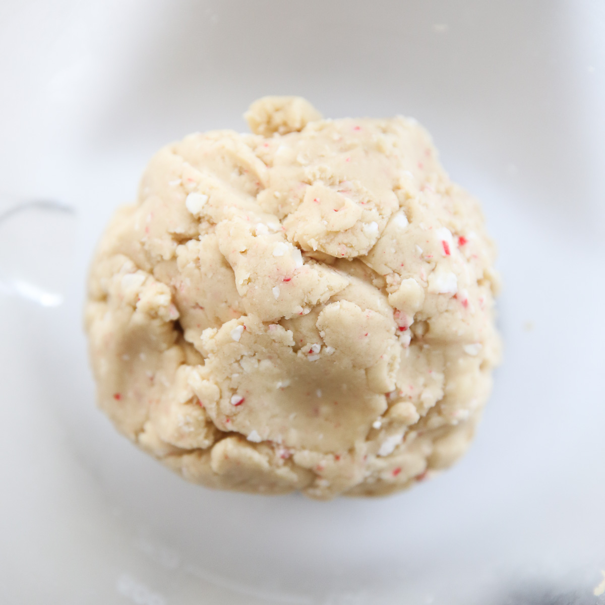 bits of candycane in cookie dough