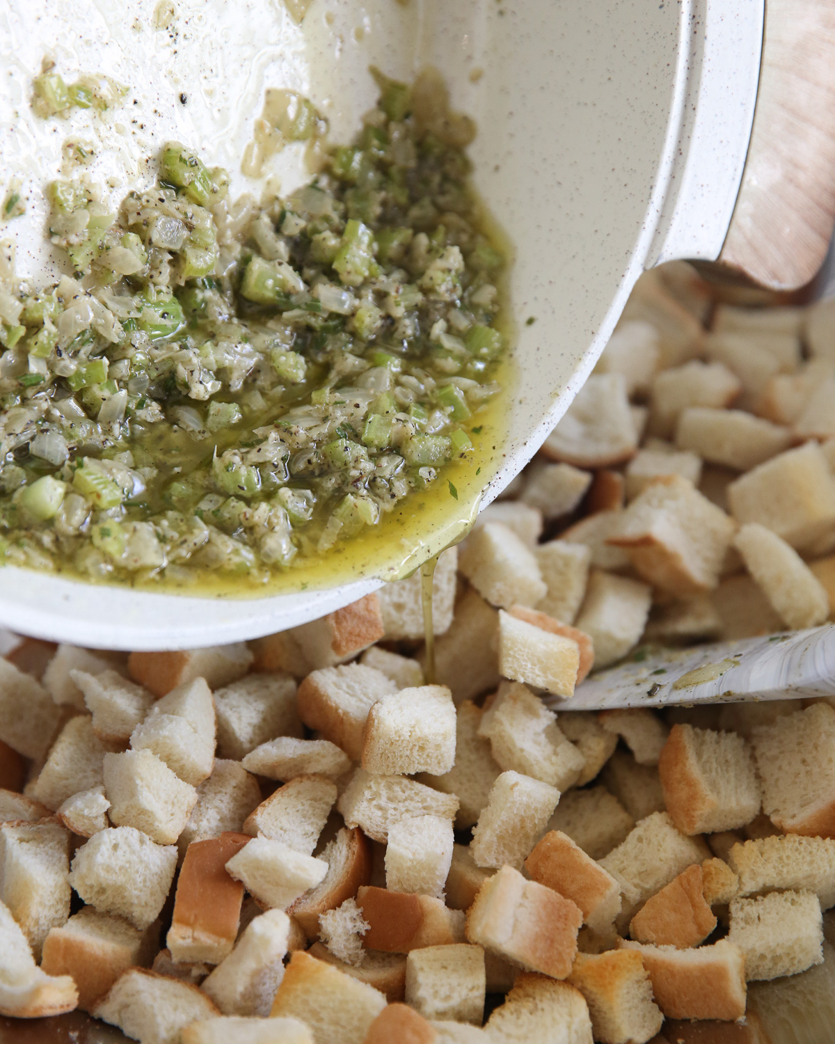 celery and onion in butter poured over bread