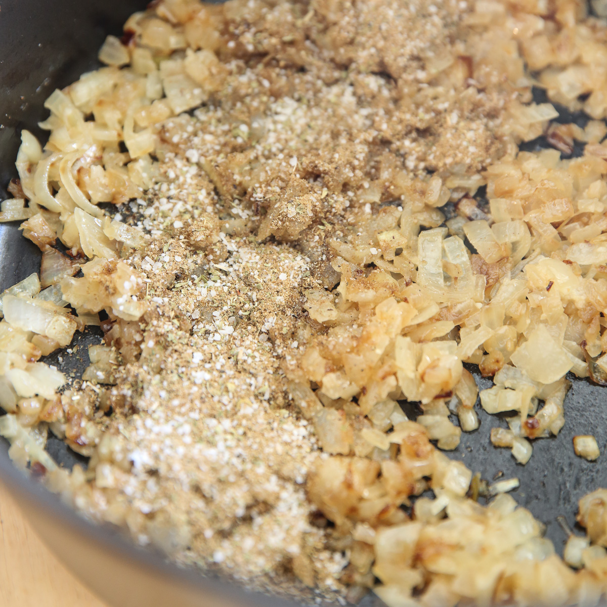 sauteing onions and seasonings in a pot