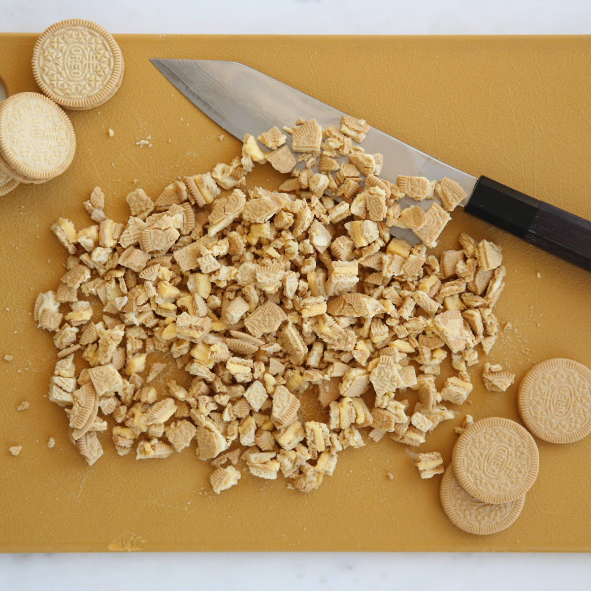 chopped oreos on a cutting board