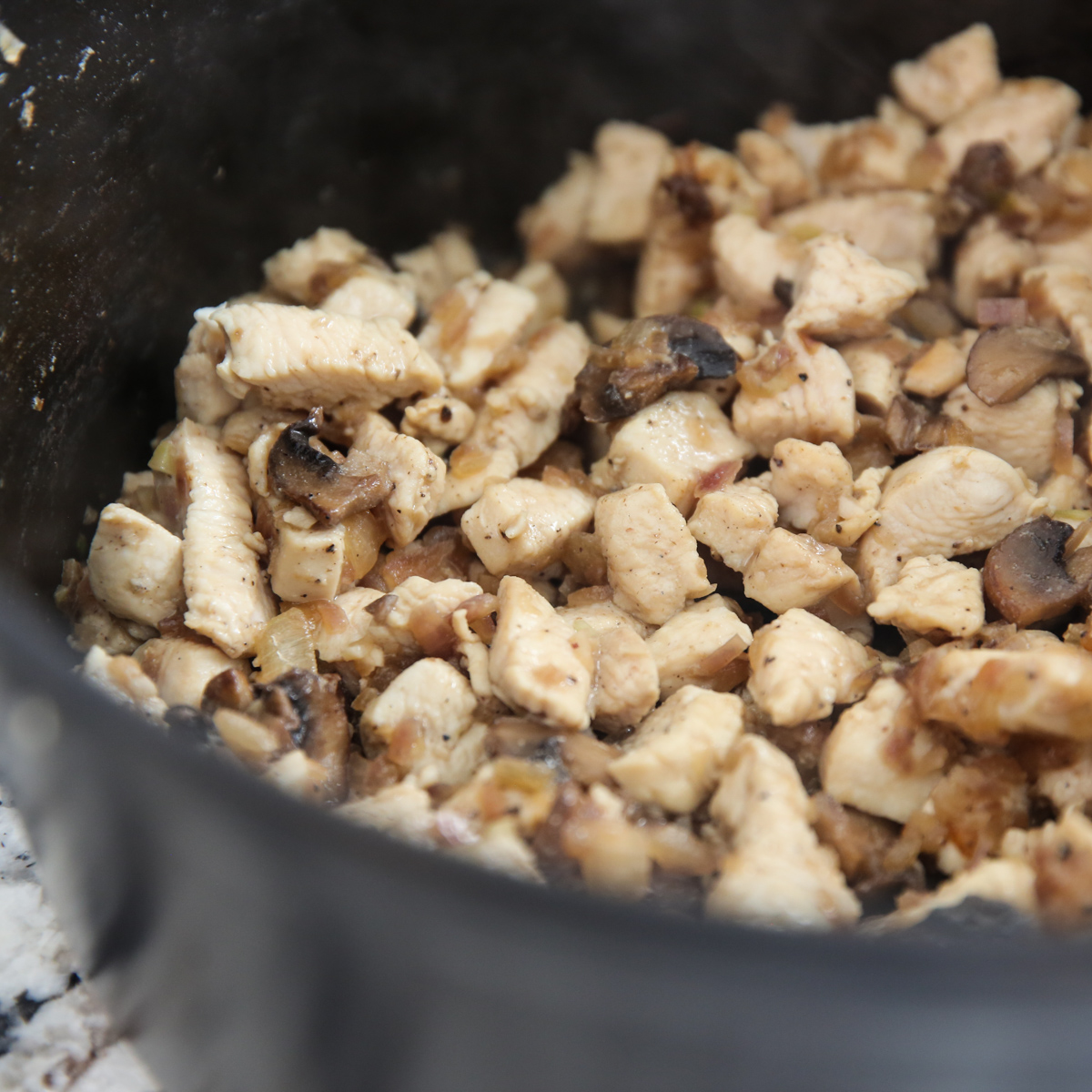 chicken cooked in a stock pot