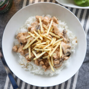 brazilian stroganoff over rice with potato stix