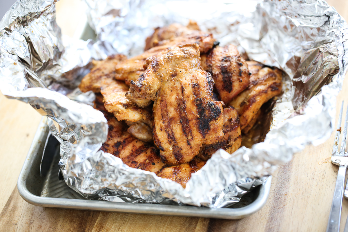 Grilled chicken thighs in foil