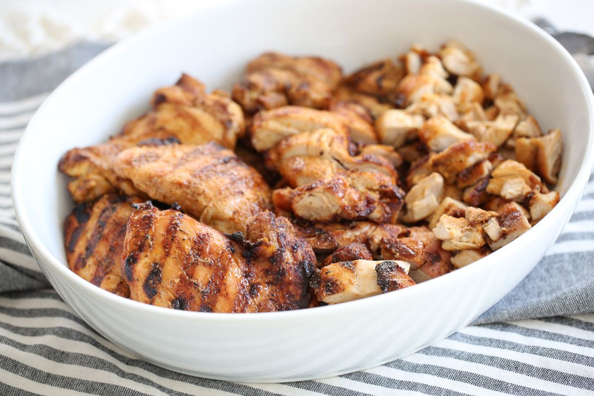 grilled chicken thighs in a serving bowl
