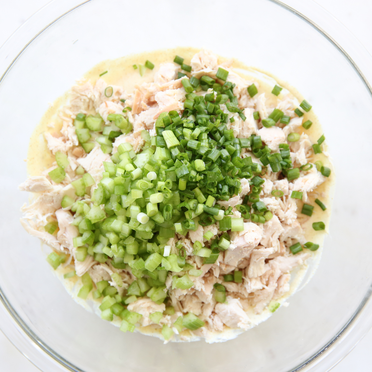 chicken salad ingredients in a bowl