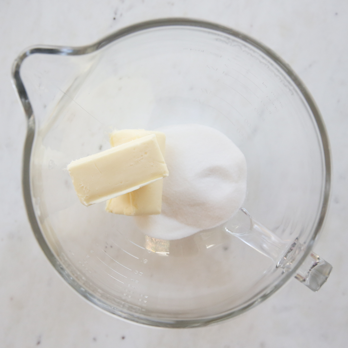 butter and sugar in a mixing bowl