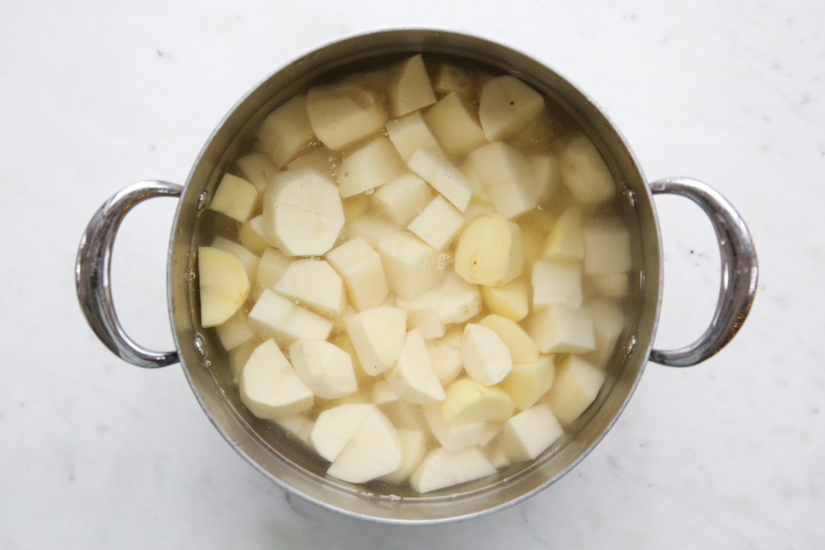 chopped potatoes in a pot ready for cooking
