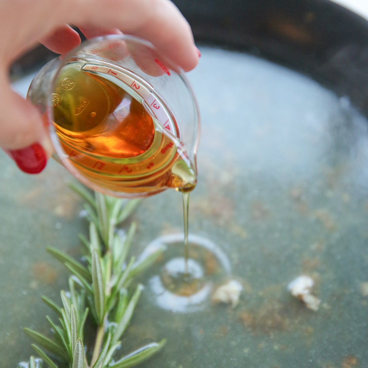 drizzling honey in skillet