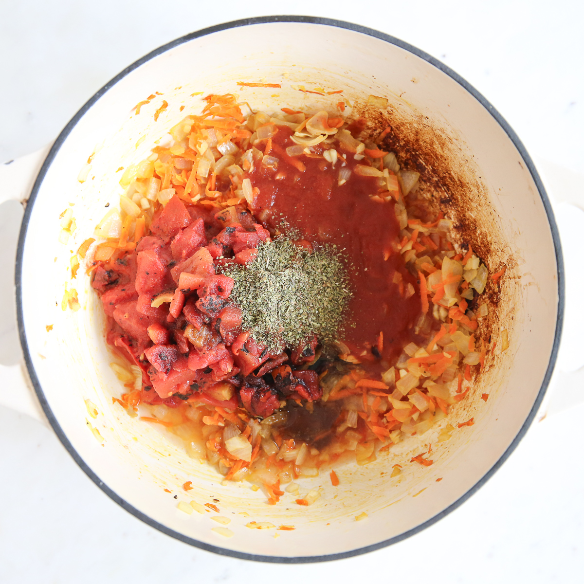 Italian seasonings are added to pot.