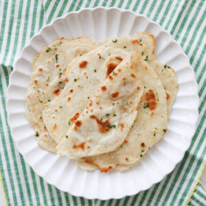 folded flatbreads on a plate