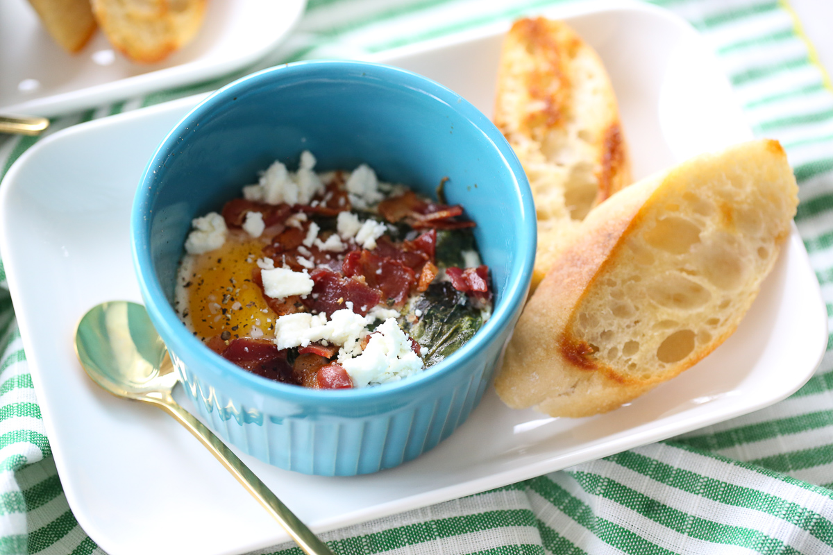 baked eggs in ramekins with toasted baguette