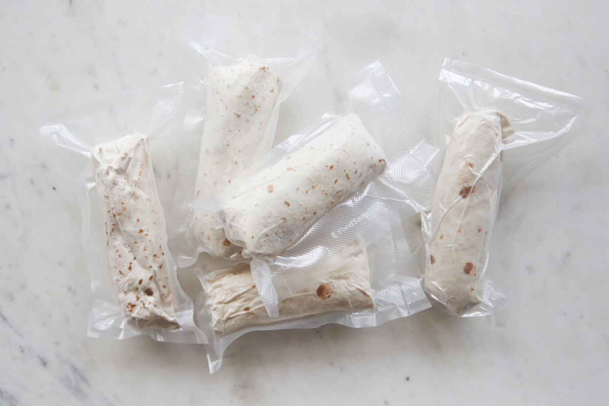 frozen burritos wrapped in food saver bags