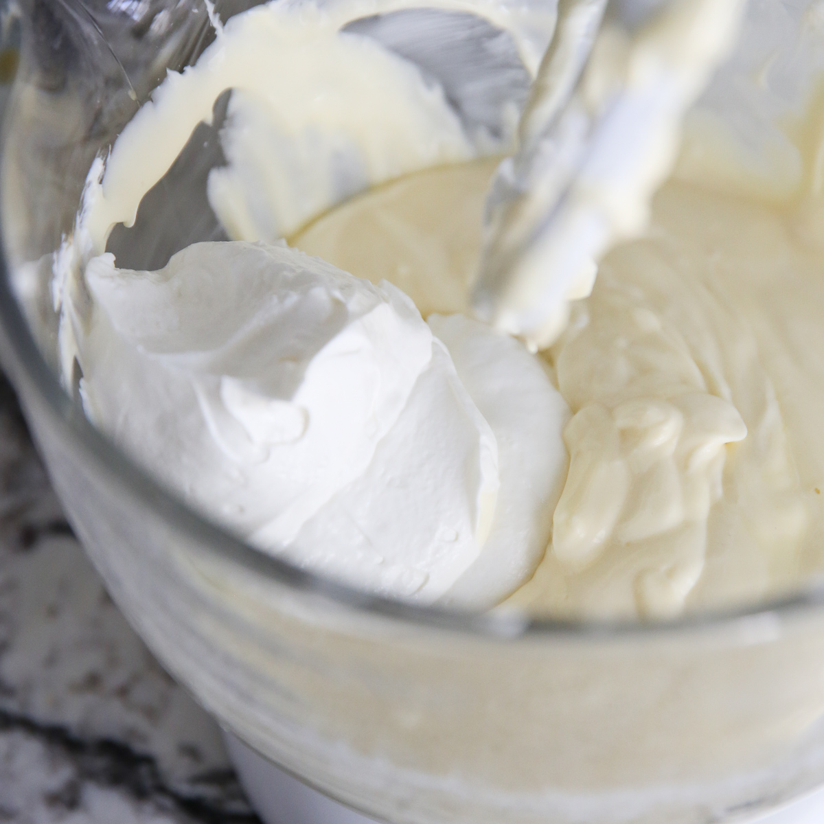 adding sour cream to cheesecake batter