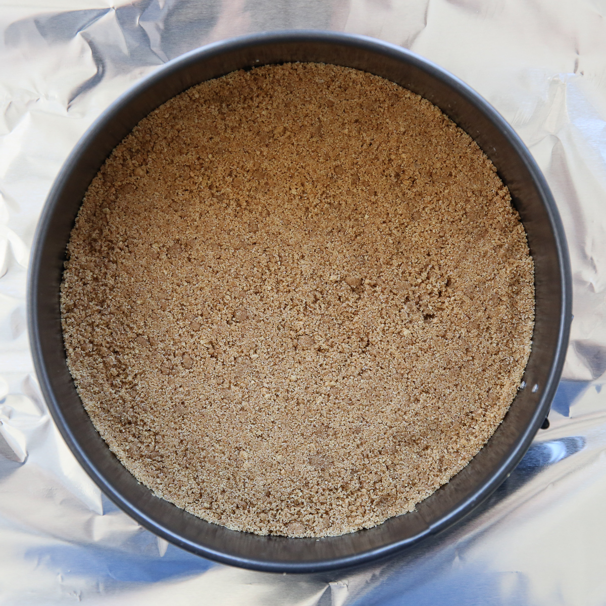 graham cracker crust in a springform pan