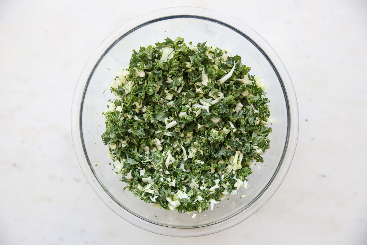 finely chopped salad ingredients in a glass bowl