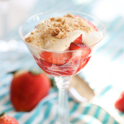 strawberries with cream and cookies on top
