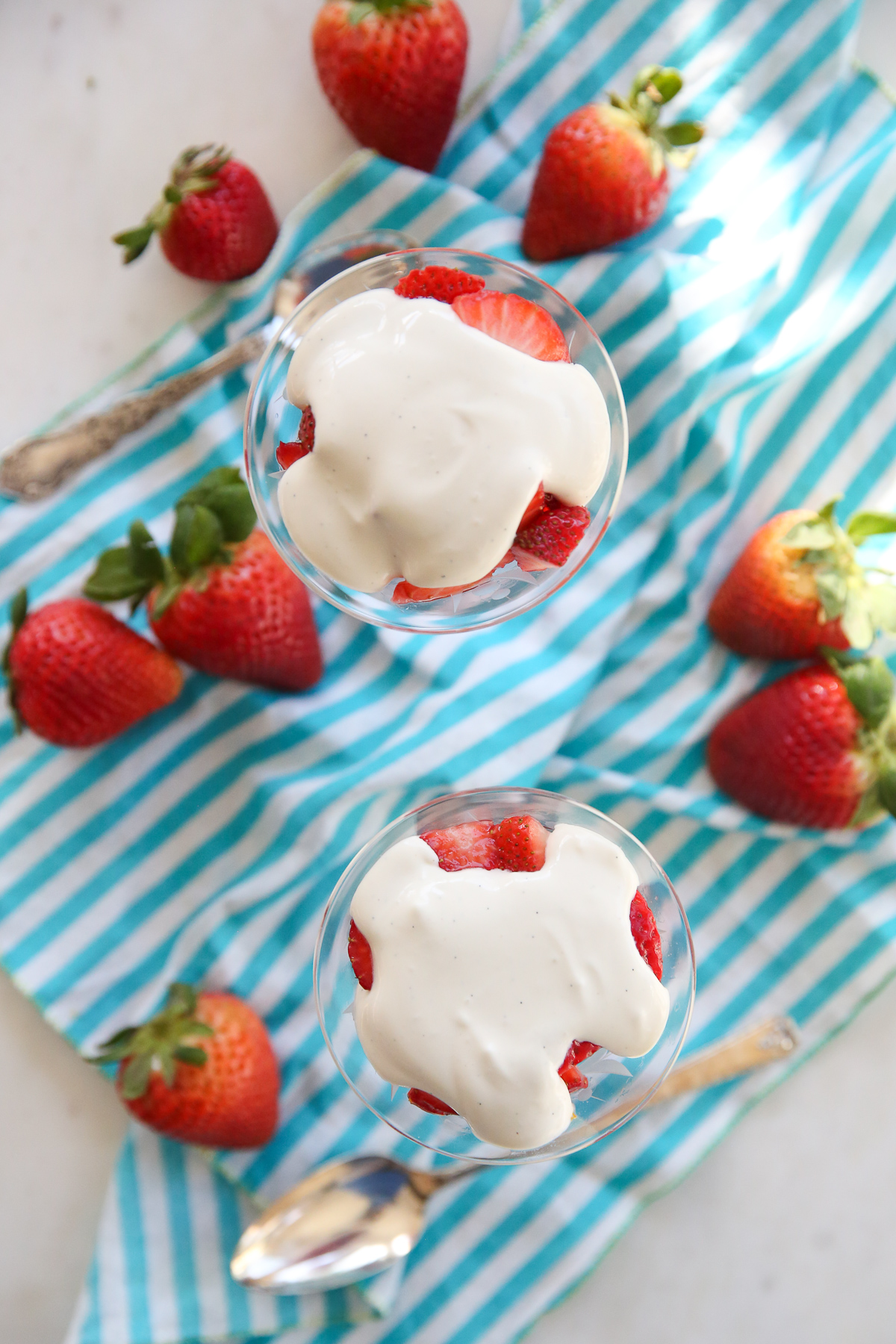 overhead shot of strawberries romanoff in crystal glasses