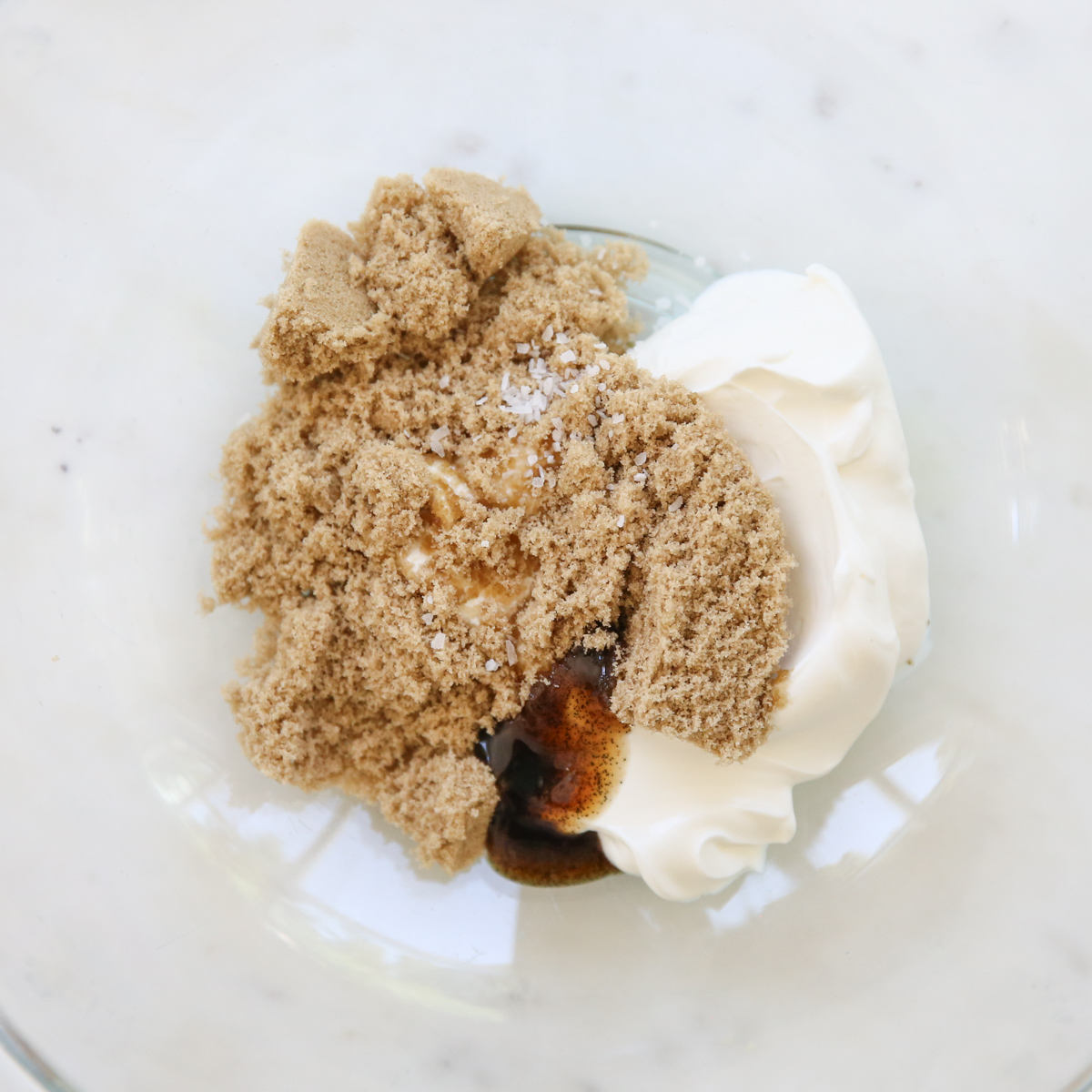 sour cream, vanilla, and brown sugar in a bowl
