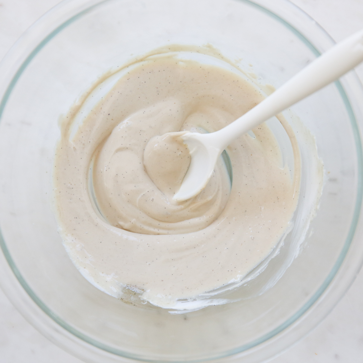 stirring sour ream into brown sugar