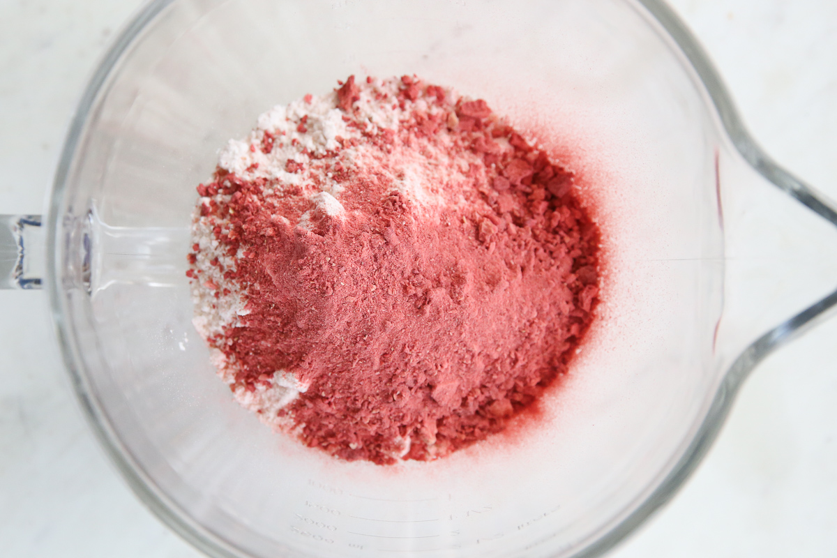cake mix and freeze dried strawberries in a mixing bowl