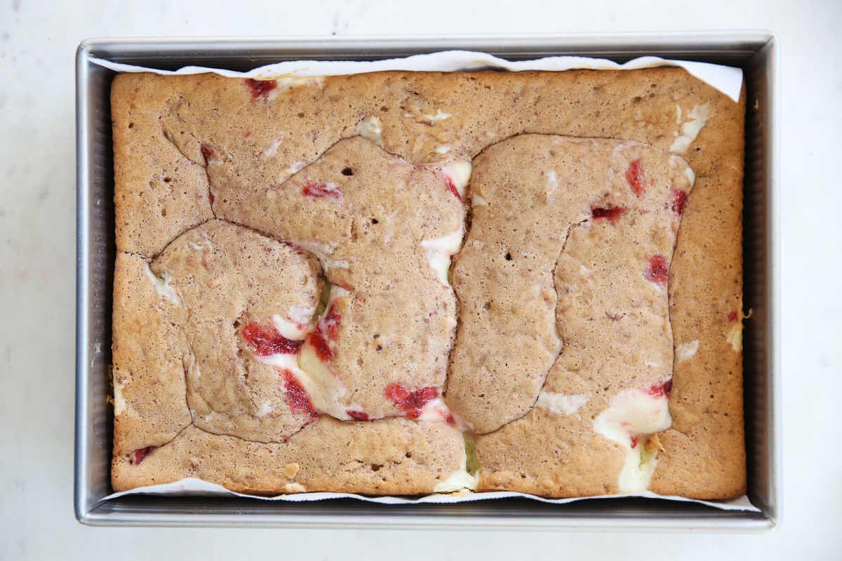 fully baked strawberry cheesecake swirl cake in a cake pan