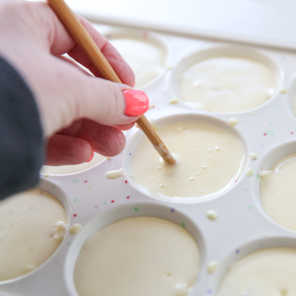 stirring egg mixture with a chop stick